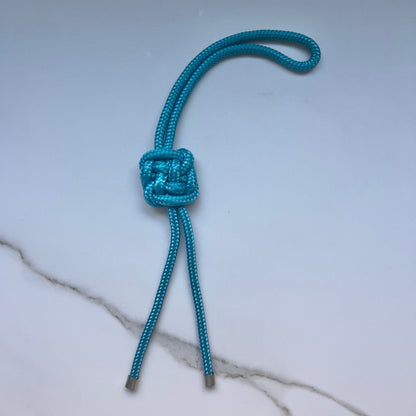 The PLAFOND KNOT Charm